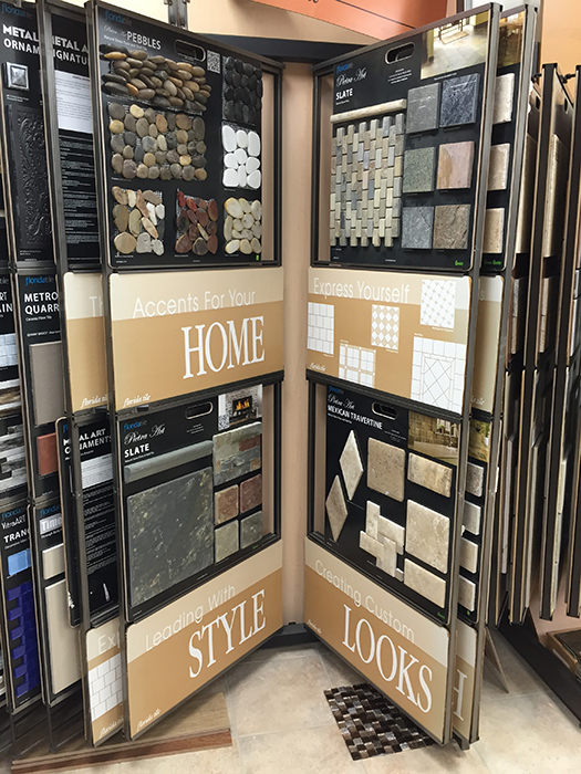 Tile flooring samples laid out on the showroom floor